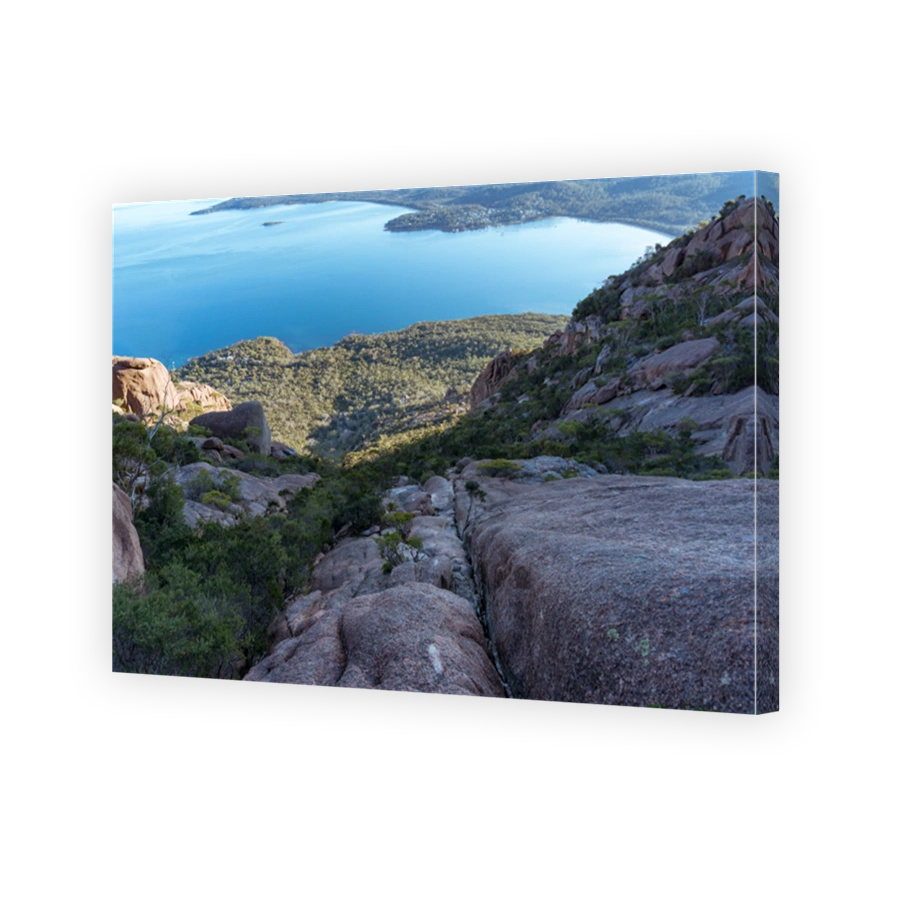 Looking down the cliff. Climbing Mt Amos in Tasmania, Australia