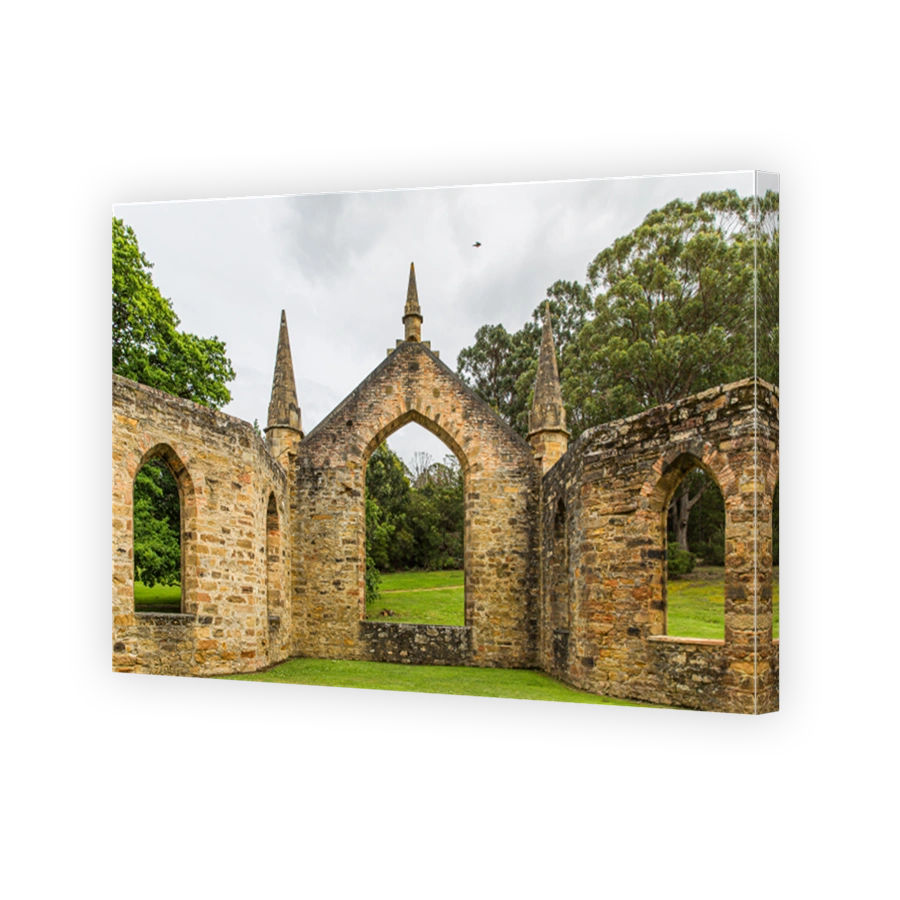 Ruins at the Port Arthur Historic Site surrounded by greenery in Tasmania, Australia