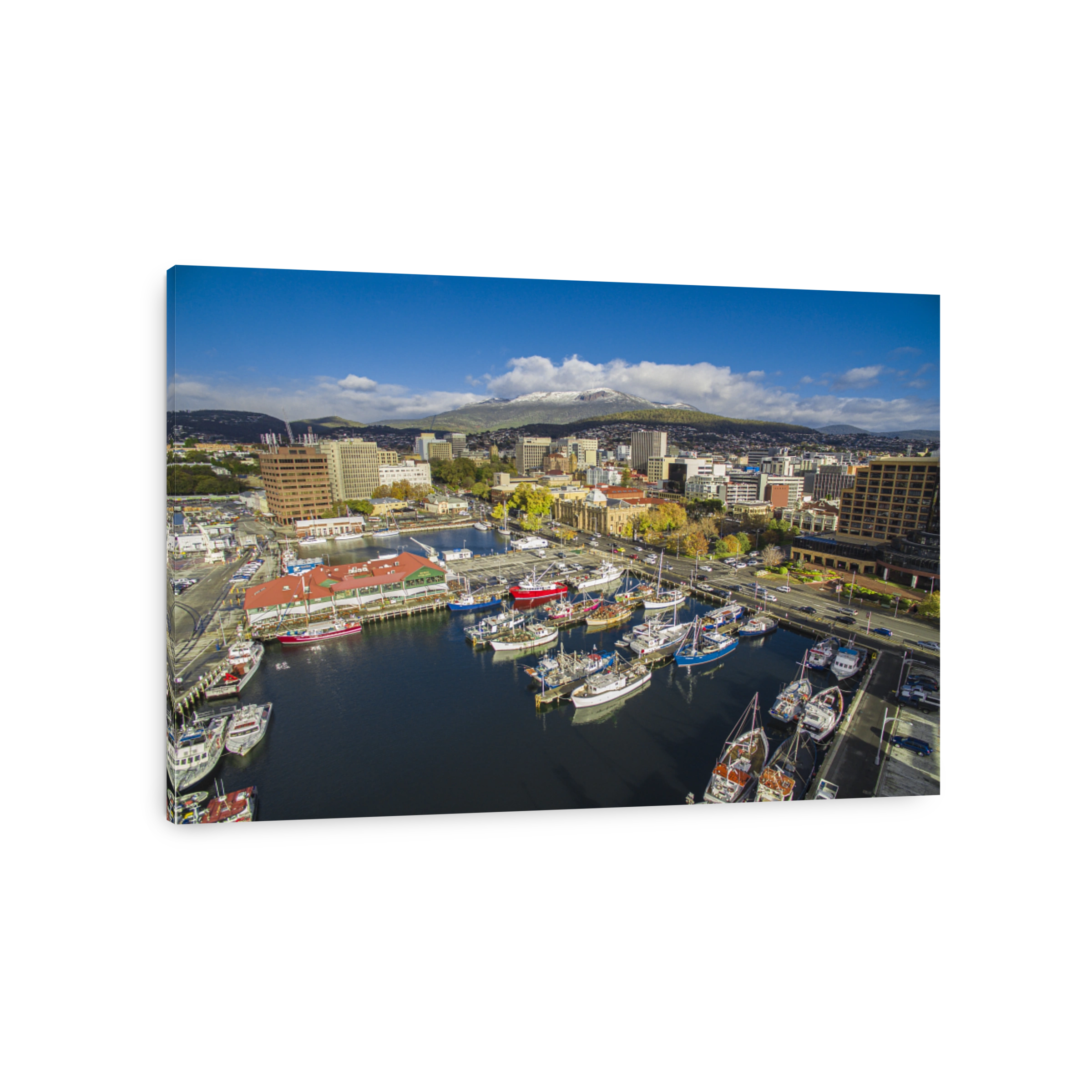 Boats docked on Hobart Waterfront in front of Mount Wellington
