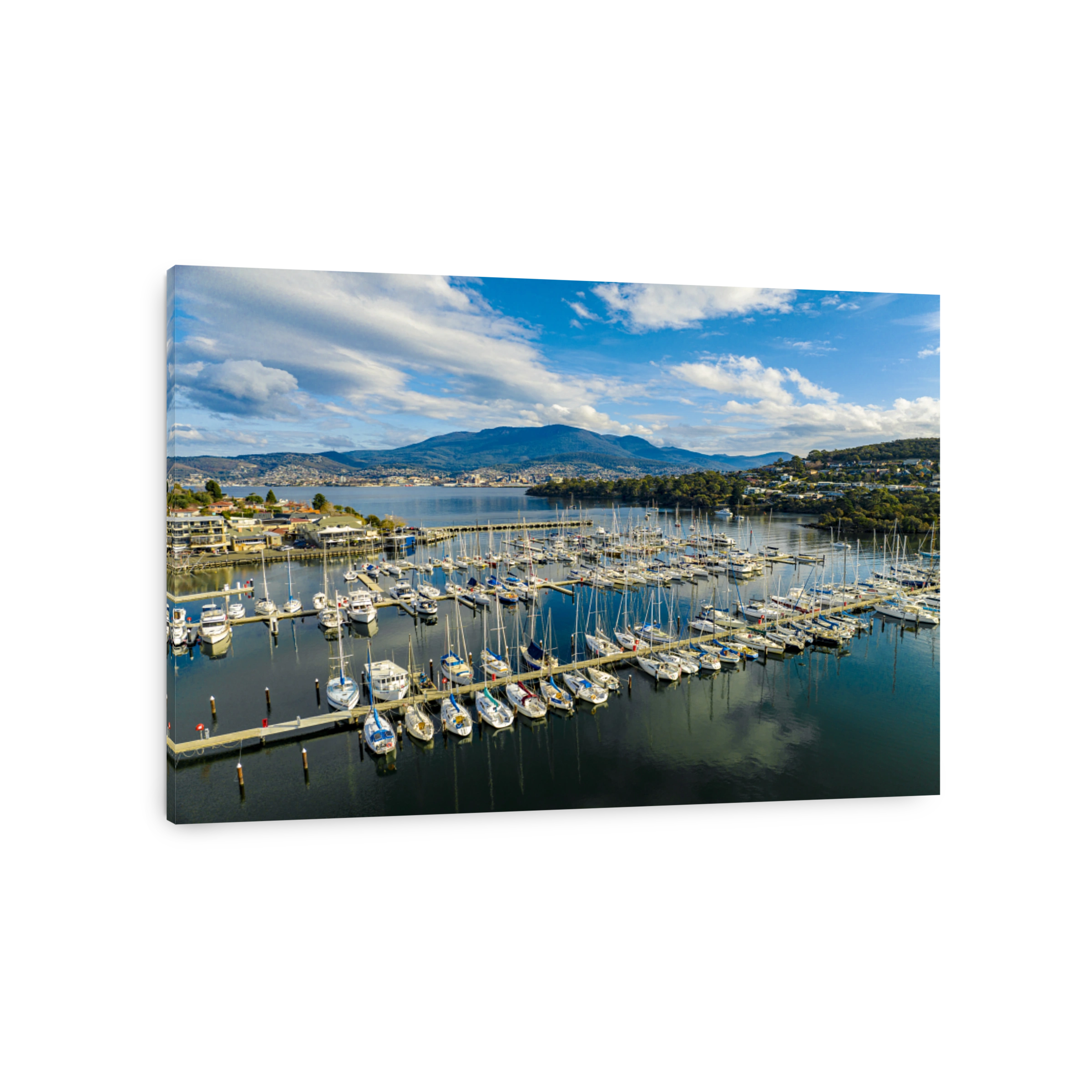 Yachts moored at Hobart's Bellerive Pier in front of Mount Wellington from the air
