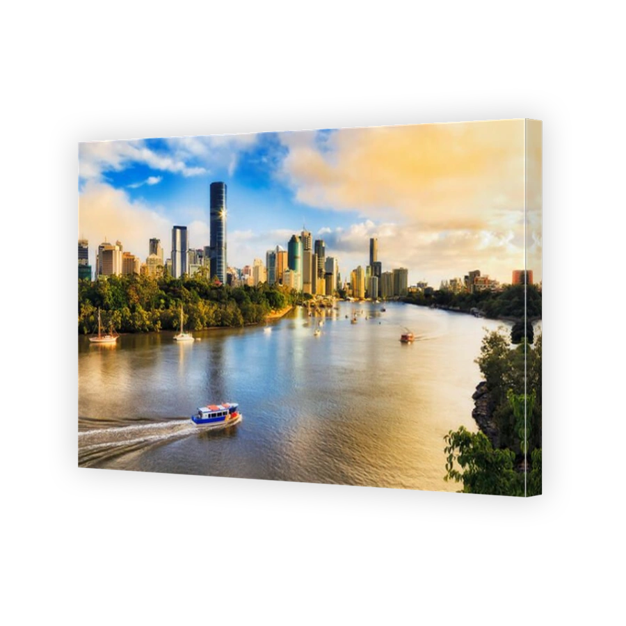 Colourful sunrise and soft morning sun light in Brisbane city over Brisbane river and high-rise CBD towers from elevation of Kangaroo point and Cliffs