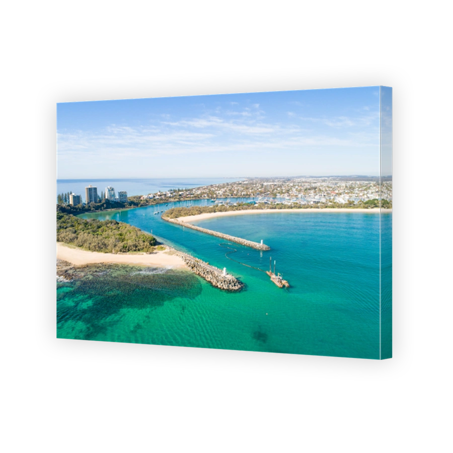 Beautiful aerial sunrise with beach, water, boats, shops and lovely holiday feel at Mooloolaba, Sunshine Coast, close to Brisbane in Queensland. Top view near Point Cartwright, river mouth and tourist
