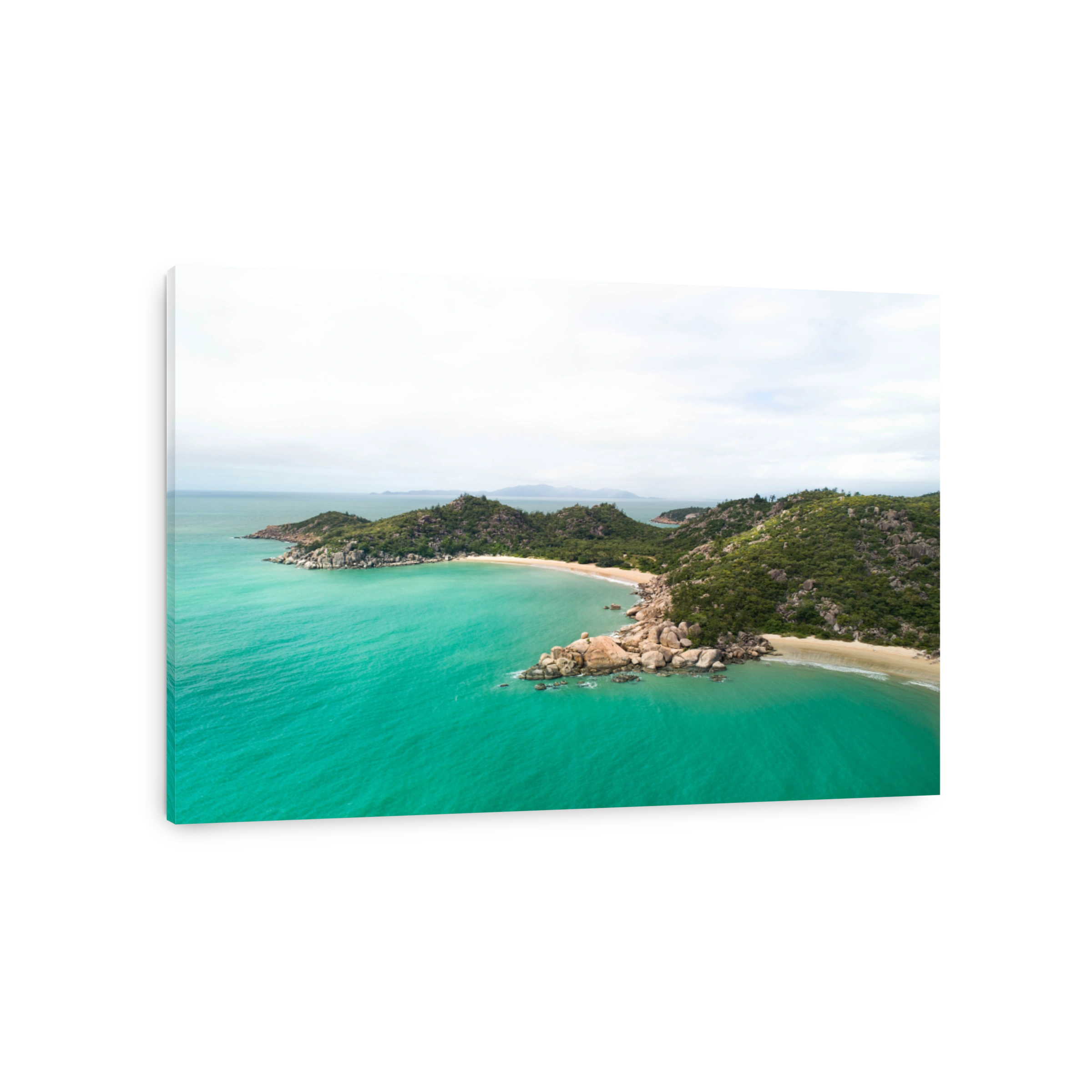 Aerial views over a tropical island in a middle of an archipelago