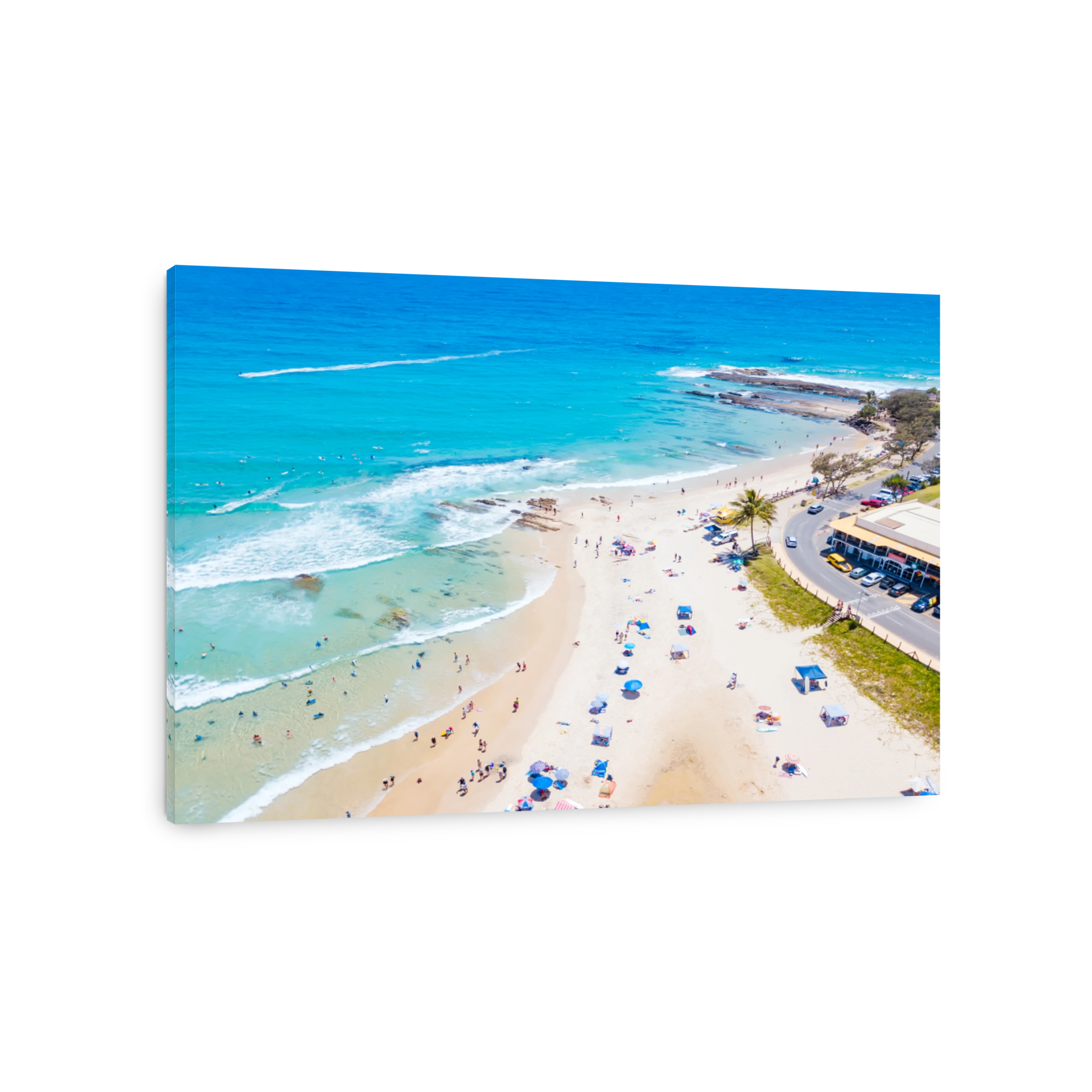 An aerial view of people sun baking at the beach at Rainbow Bay in Coolangatta