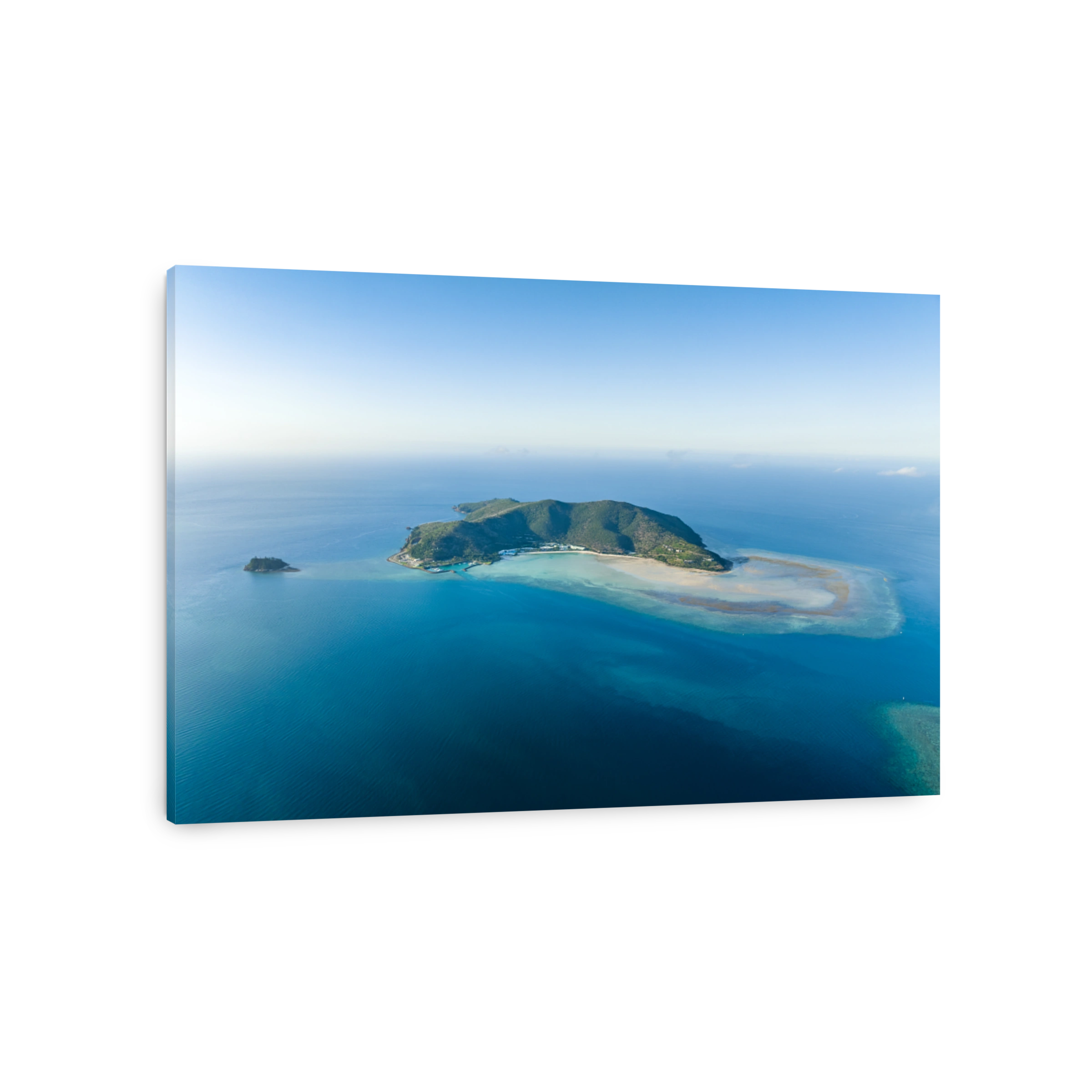 Stunning aerial drone view of Hayman Island, the most northerly of the Whitsunday Islands in Queensland, Australia, near the Great Barrier Reef. Popular tourist destination with a resort hotel.