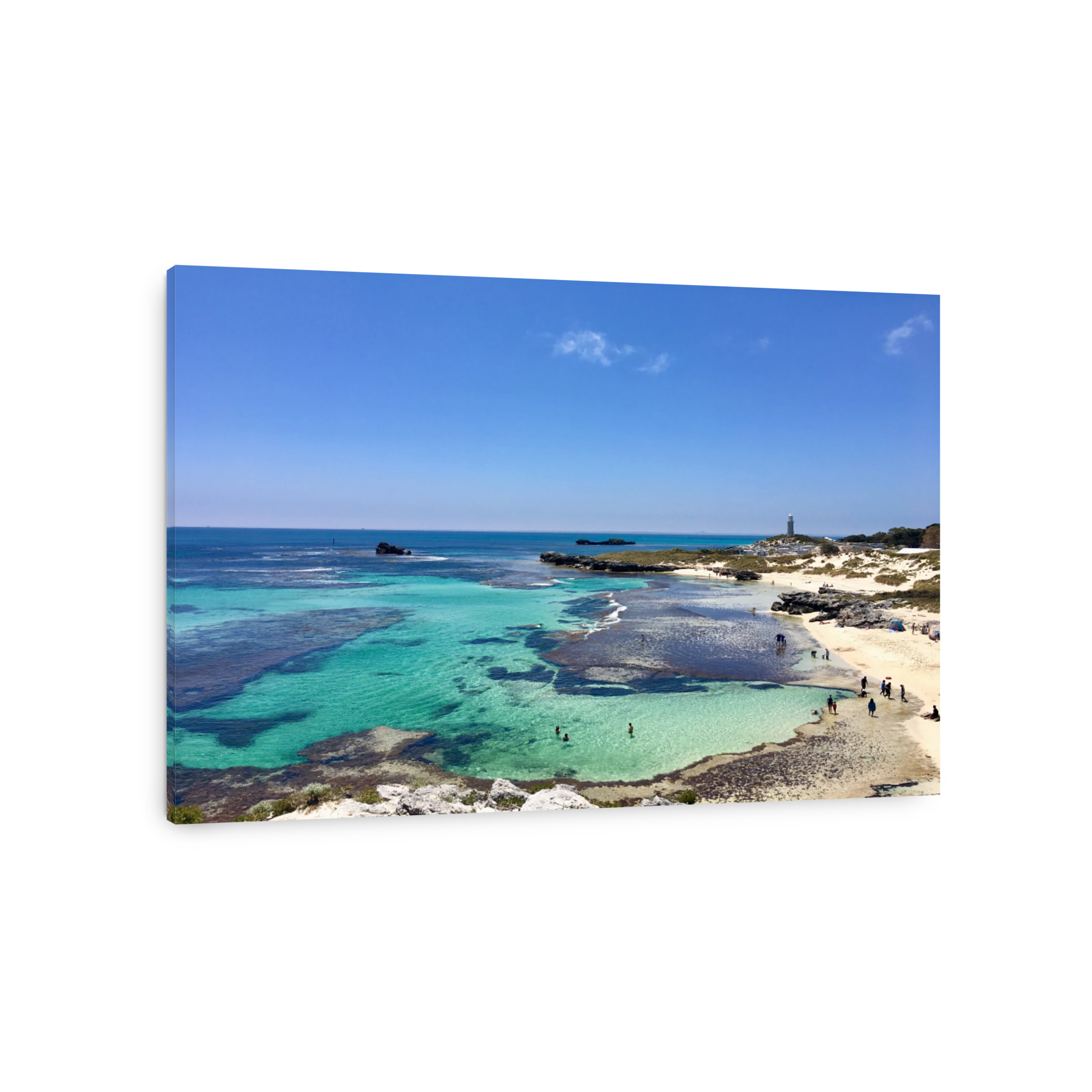 Scenic View Of Sea Against Blue Sky
