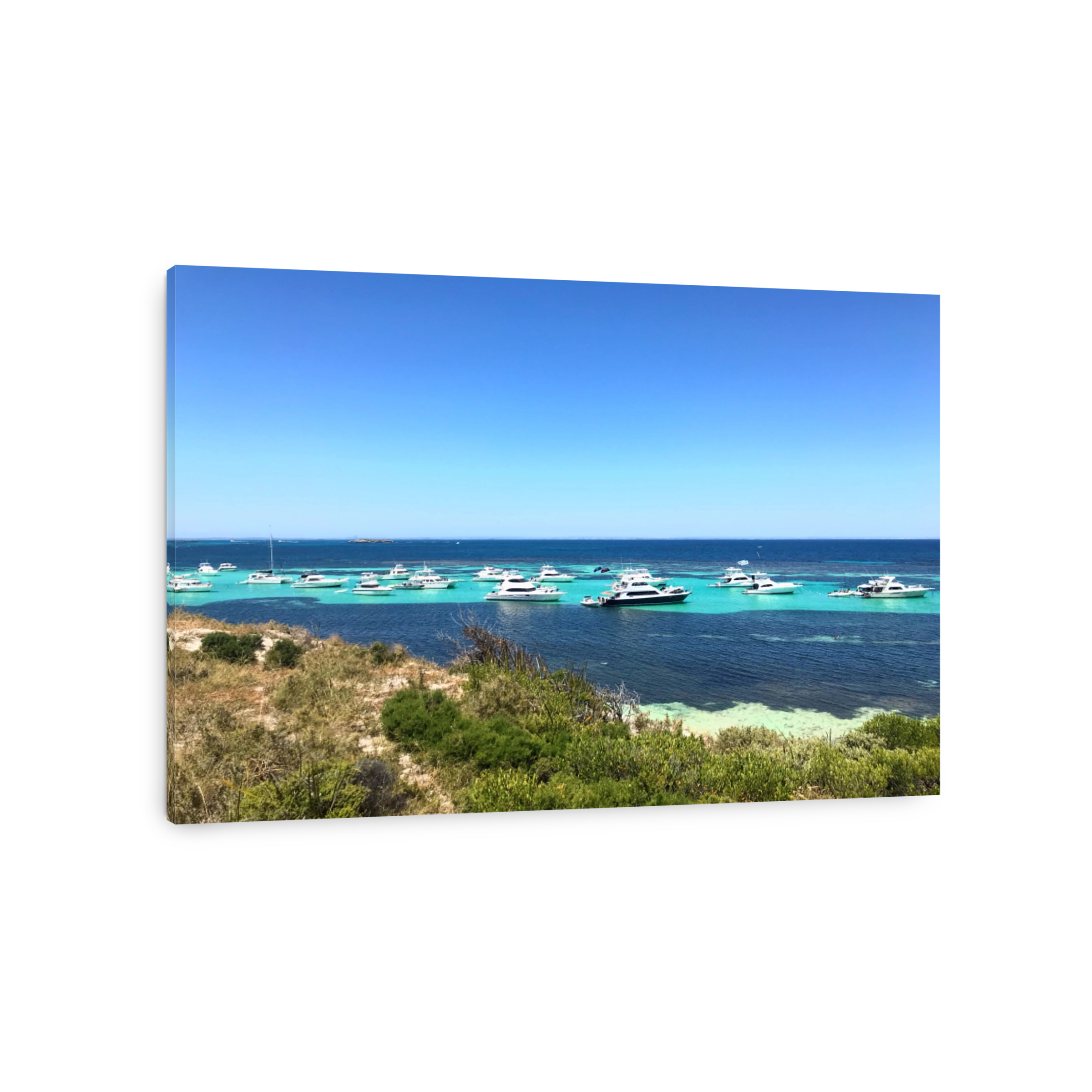 Boats Sailing In Sea Against Clear Blue Sky