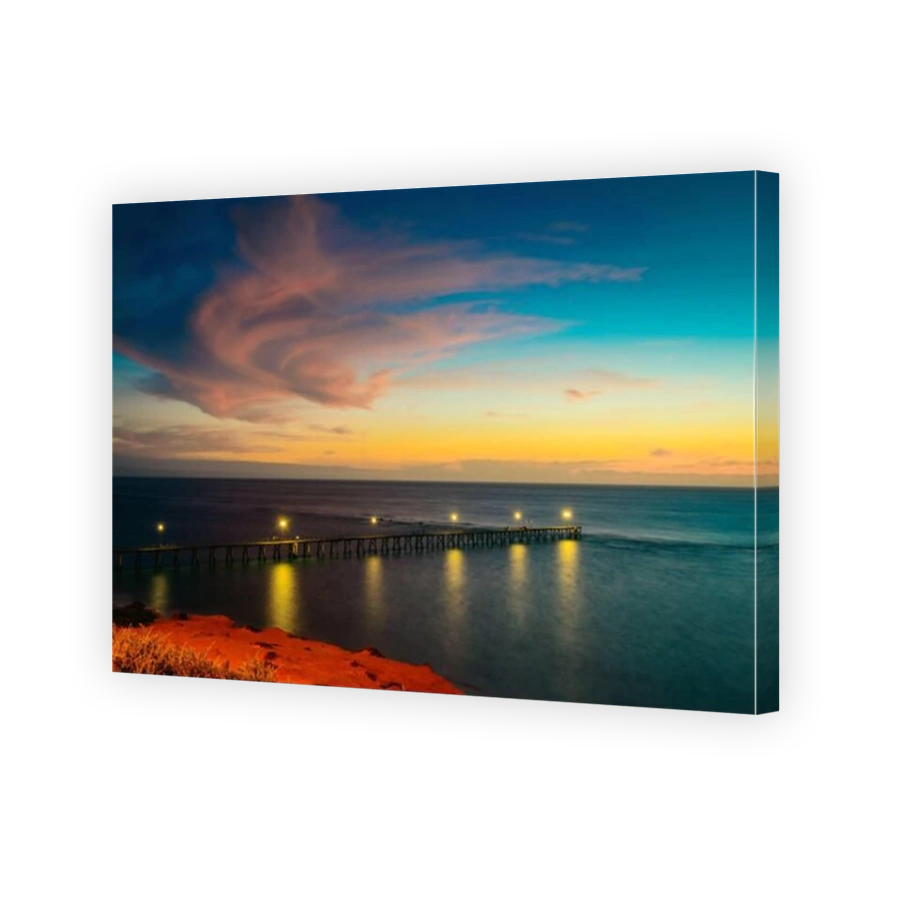 Port Noarlunga pier with light on after sunset, South Australia. Long exposure camera settings