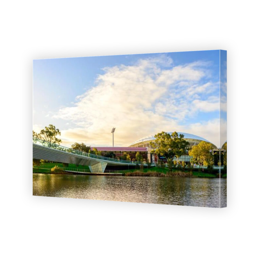 Adelaide, Australia - August 27, 2017: Adelaide Oval viewed across Torrens river in Elder Park at sunset