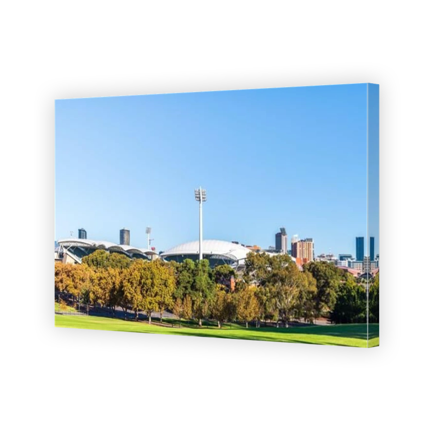 Adelaide, South Australia - April 4, 2021: Adelaide city skyline viewed from the Montefiore Hill across the Adelaide Oval on a bright day