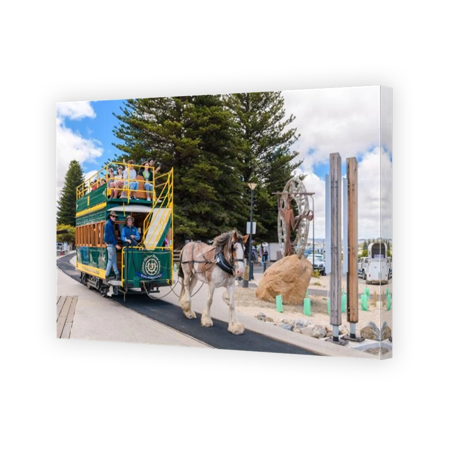 Victor Harbor, South Australia - January 5, 2022: Victor Harbor Horse Drawn Tram with people heading to the Granite Island via the newly constructed c