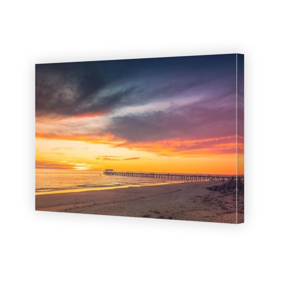 Henley Beach with jetty at sunset viewed from Esplanade, South Australia