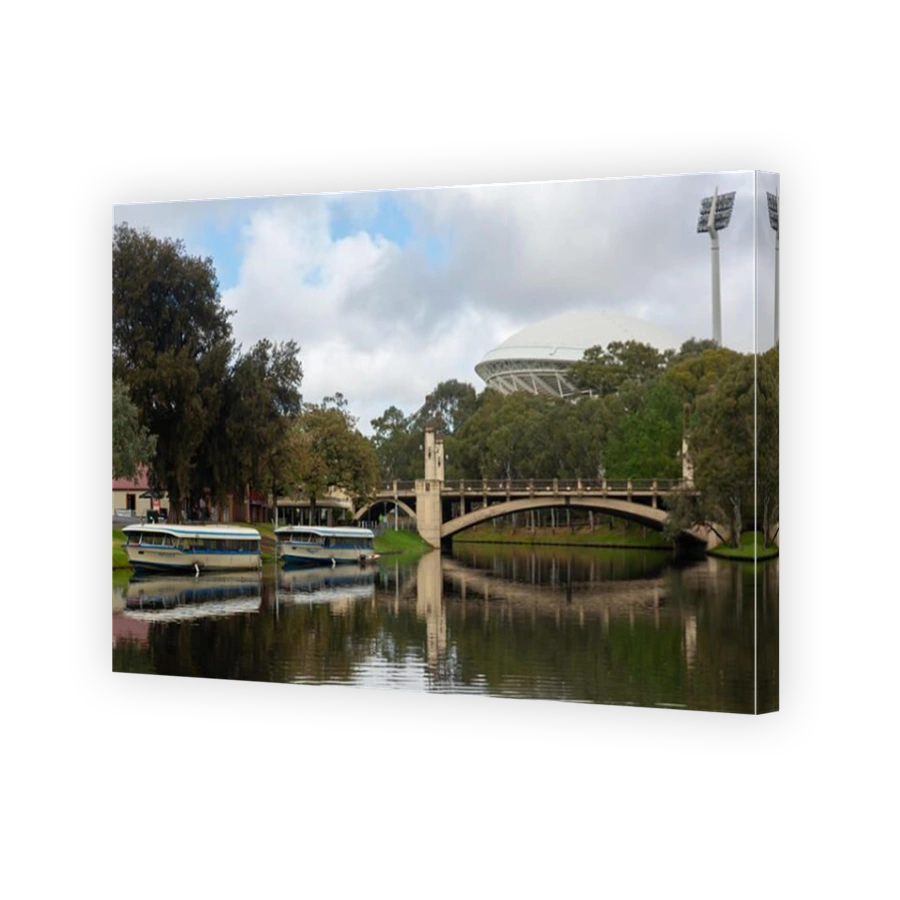 The river torrens with Popeye river boats and the iconic adelaide oval in the background on 16th October 2019