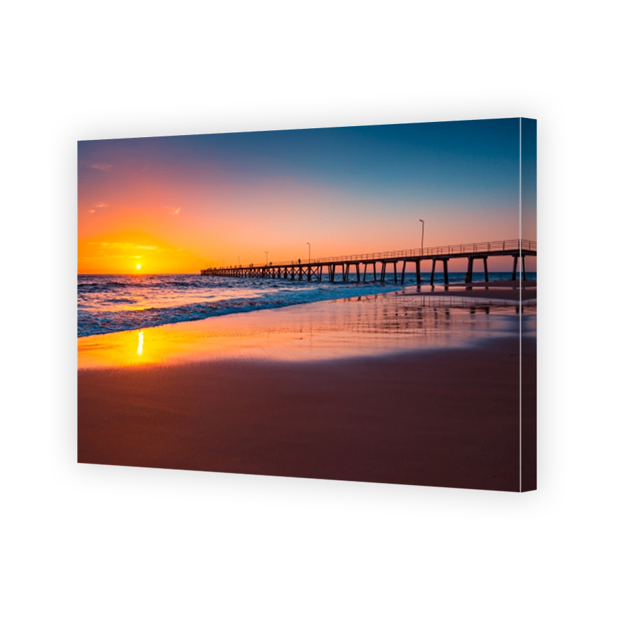 Port Noarlunga jetty with people at sunset