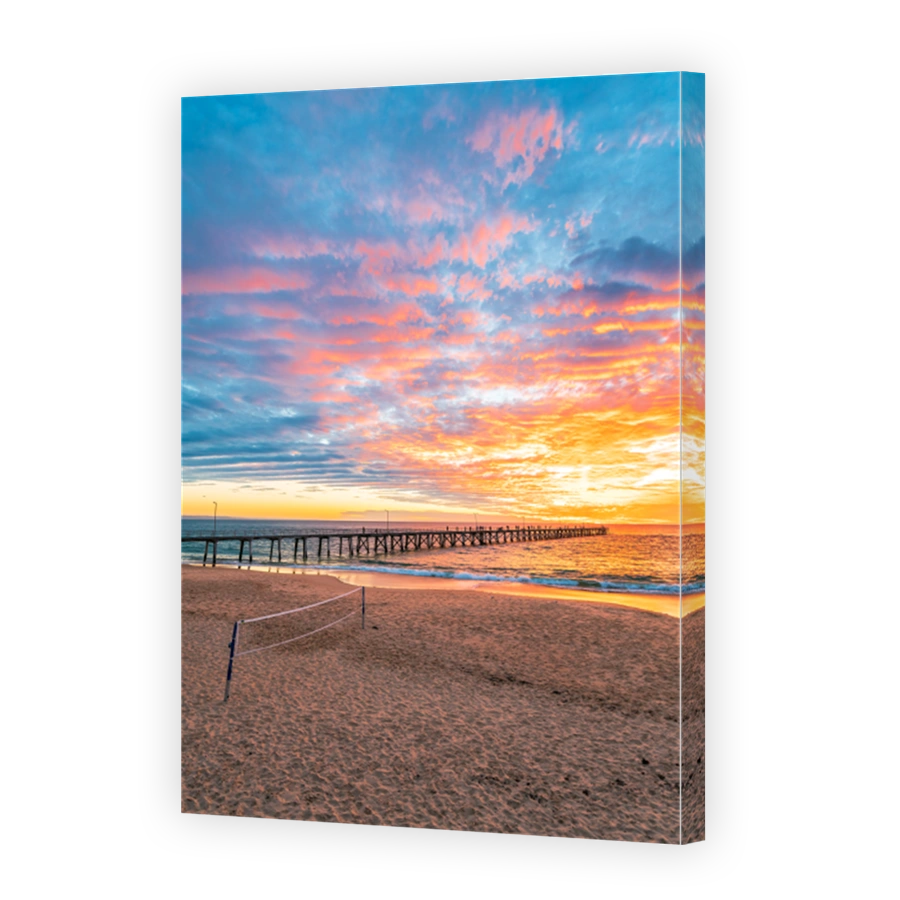 Port Noarlunga beach with with beach volleyball area at sunset