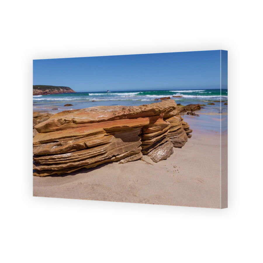 Beautiful eroded orange rocks at Stokes Bay, Kangaroo Island, Australia.