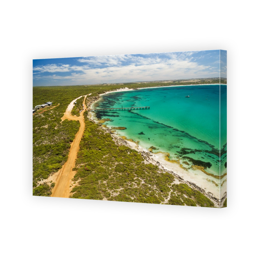 Aerial view of Vivonne Bay pier and vivid turquoise ocean water, Kangaroo Island, South Australia