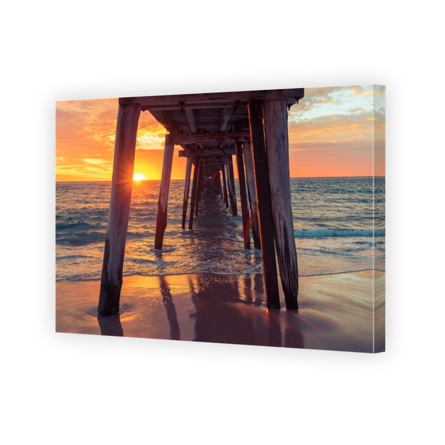 Spectacular sunset viewed from under pier at Port Noarlunga