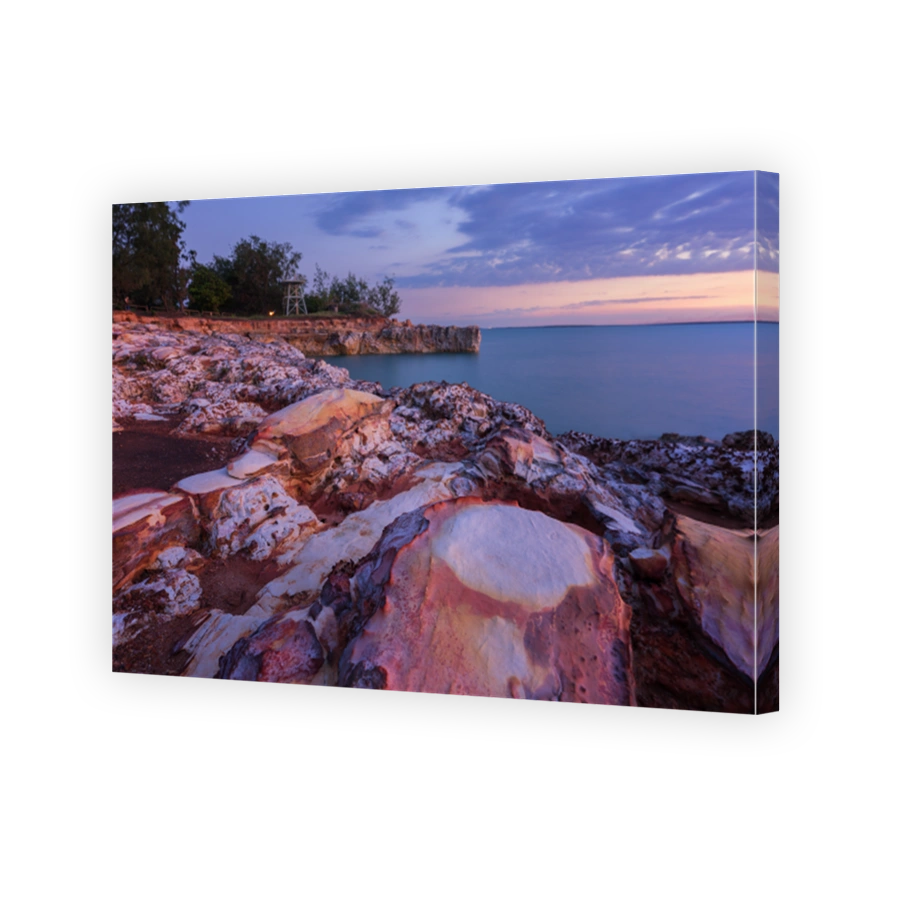 Rocky beach sunset with clouds