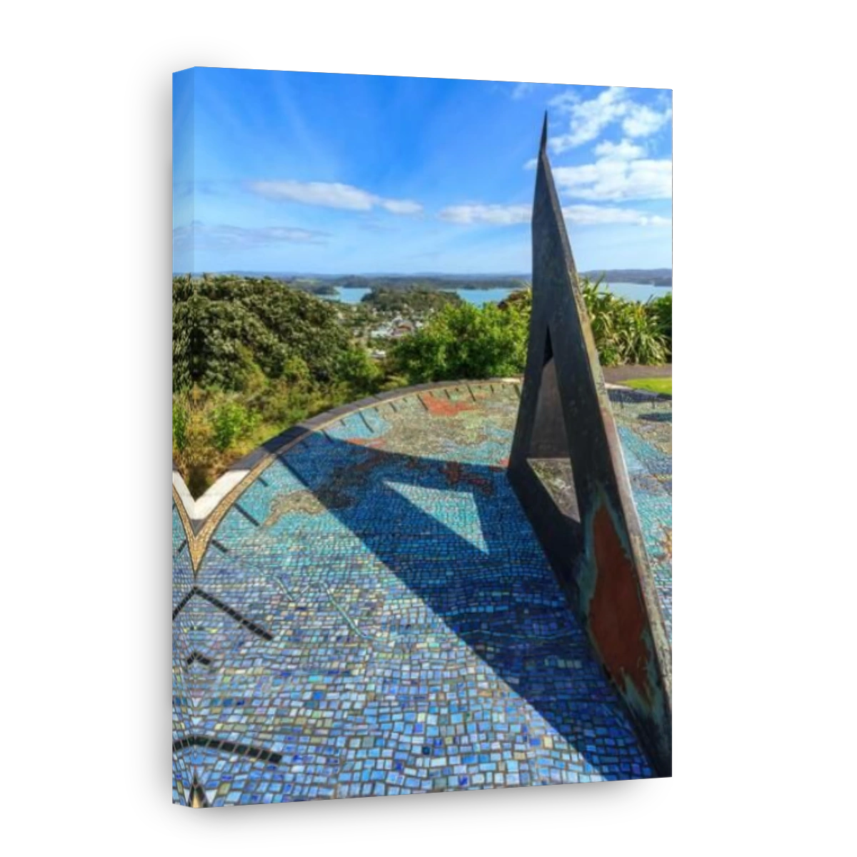 A giant sundial on Flagstaff Hill, Russell, New Zealand, overlooking the buildings of this tourist town in the Bay of Islands