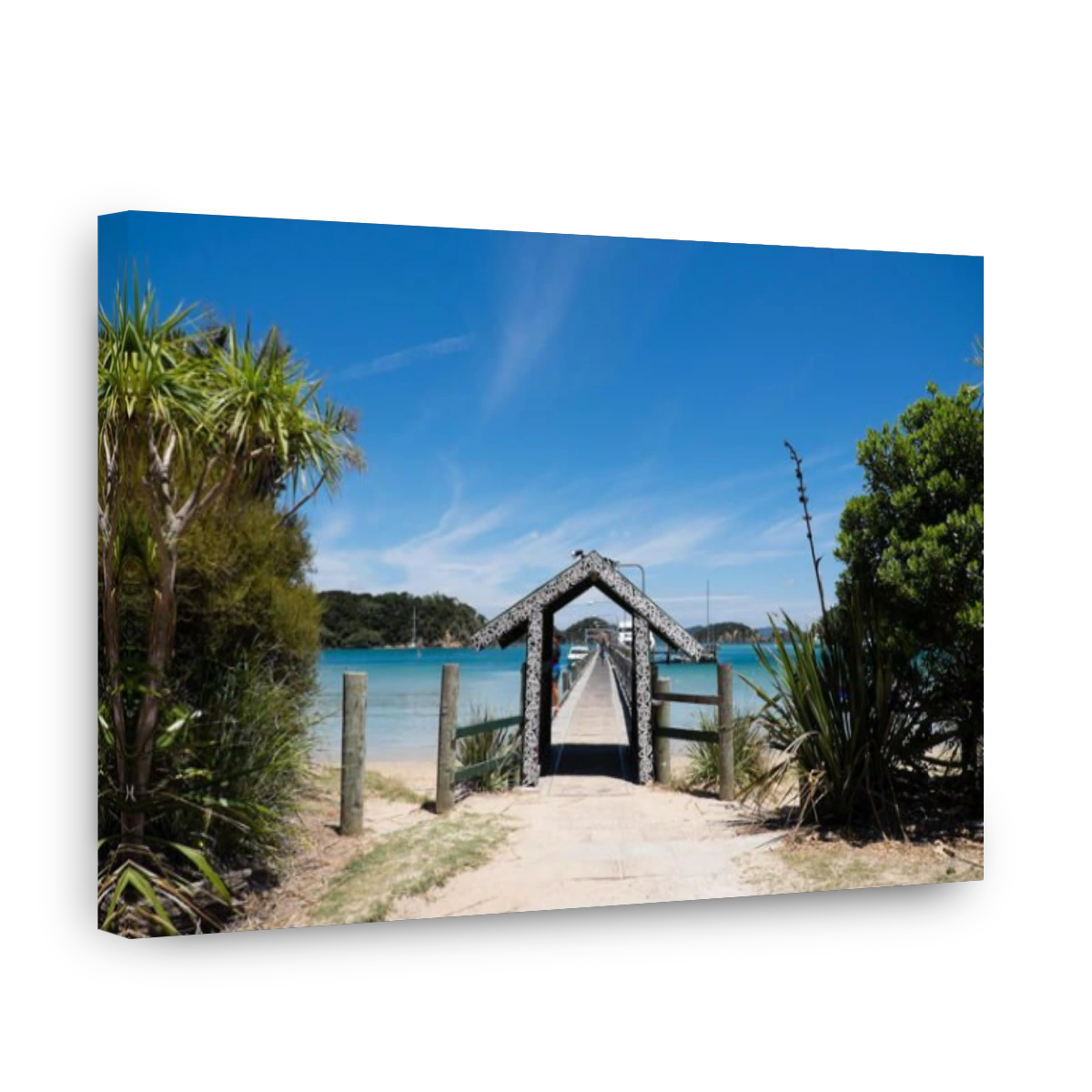 Urupukapuka Island, Bay of Islands, New Zealand, NZ - February 1, 2017: Tourist ferry pier has an archway decorated with Maori art.