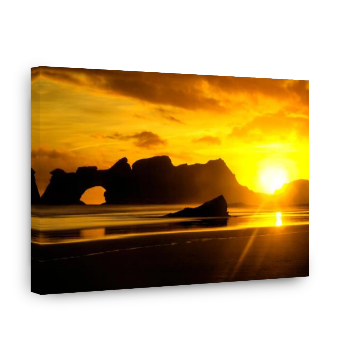 Sunrise above rocky coastline of Wharariki Beach, Cape Farewell, New Zealand