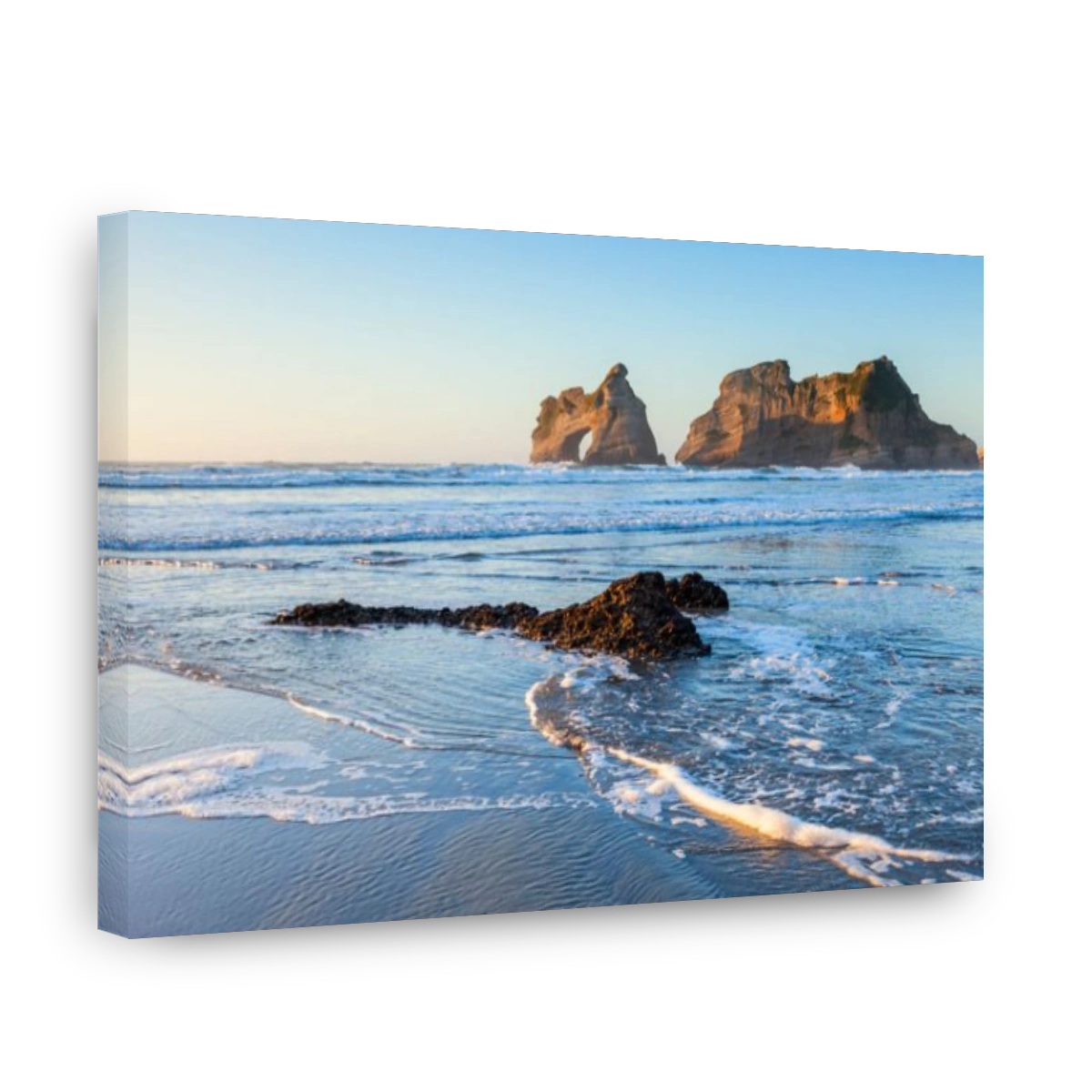 Wharariki Beach in the Tasman Region of New Zealand in the evening.