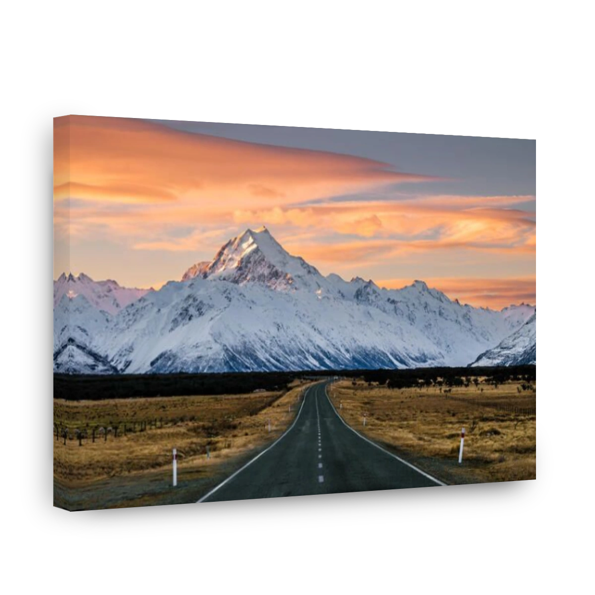 View of the majestic Aoraki Mount Cook with the road leading to Mount Cook Village. Taken during winter in New Zealand.