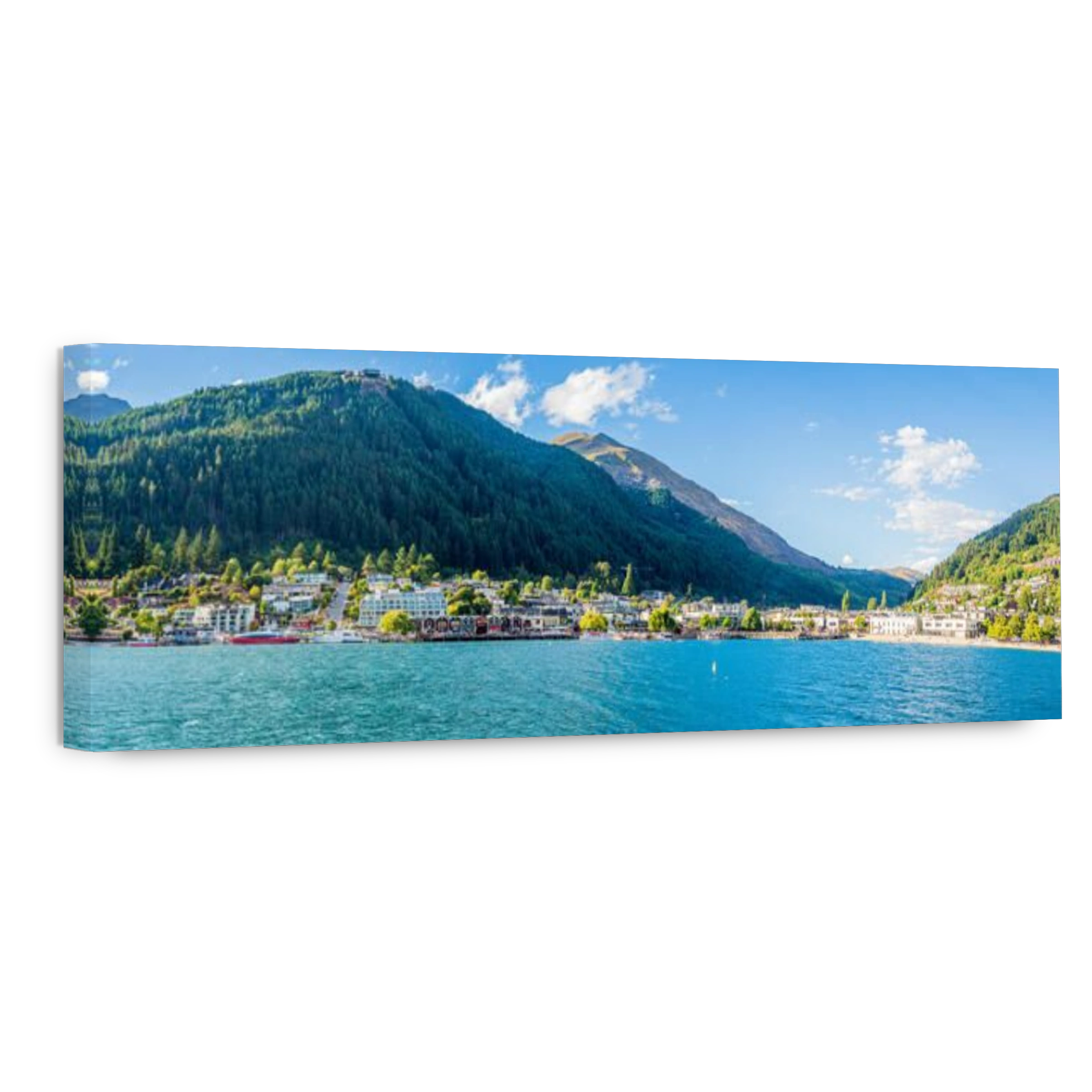 beautiful Queenstown from on board a boat on the lake.