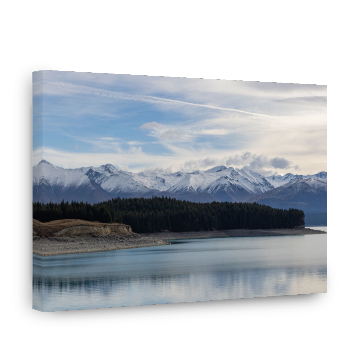 A wintry view looking across Lake Pukaki with snow-capped mountains in the distance