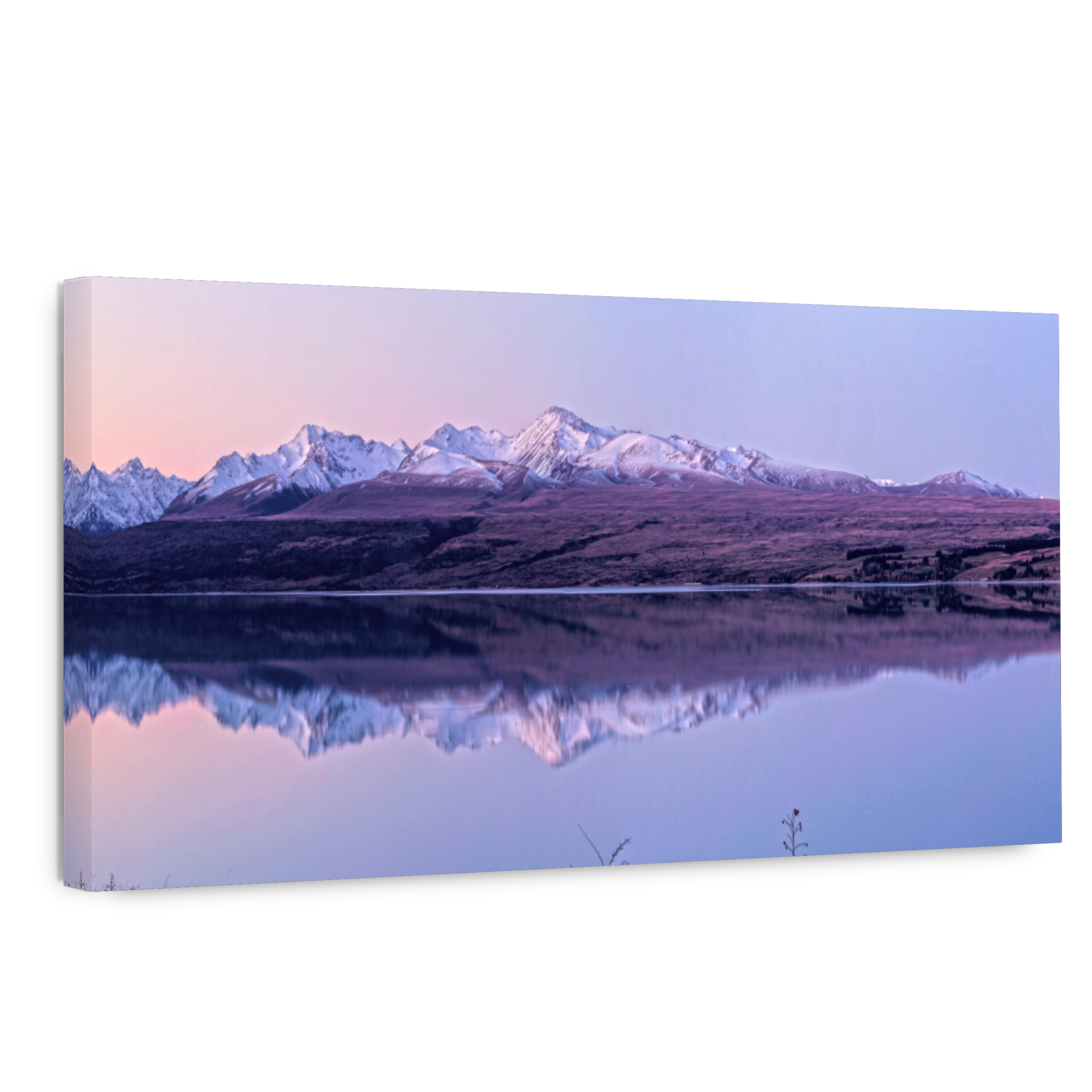 Tranquil mountain lake reflection at dawn