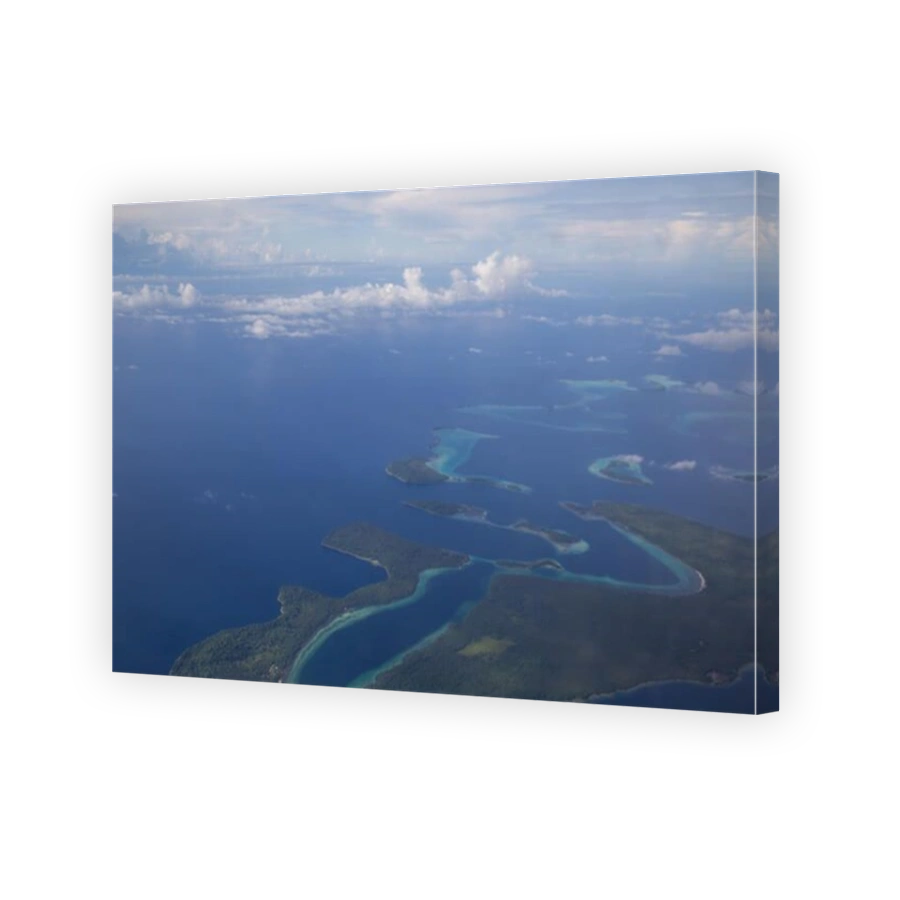 Aerial view photograph of small islands in the Solomon Islands.