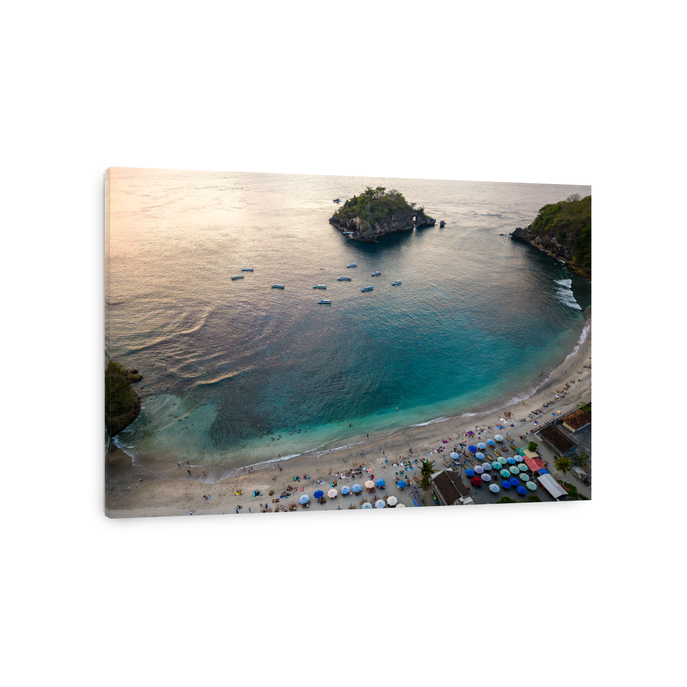 Aerial view of a sandy tropical beach and warm ocean at sunset (Crystal Bay, Indonesia)
