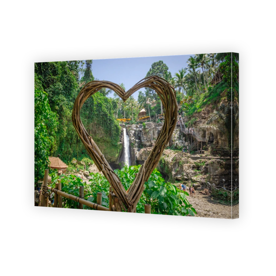 Beautiful Tegenungan waterfall in tropical rainforest in Bali, Indonesia