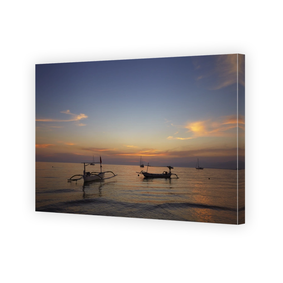 sunrise over fishing boats on Bali