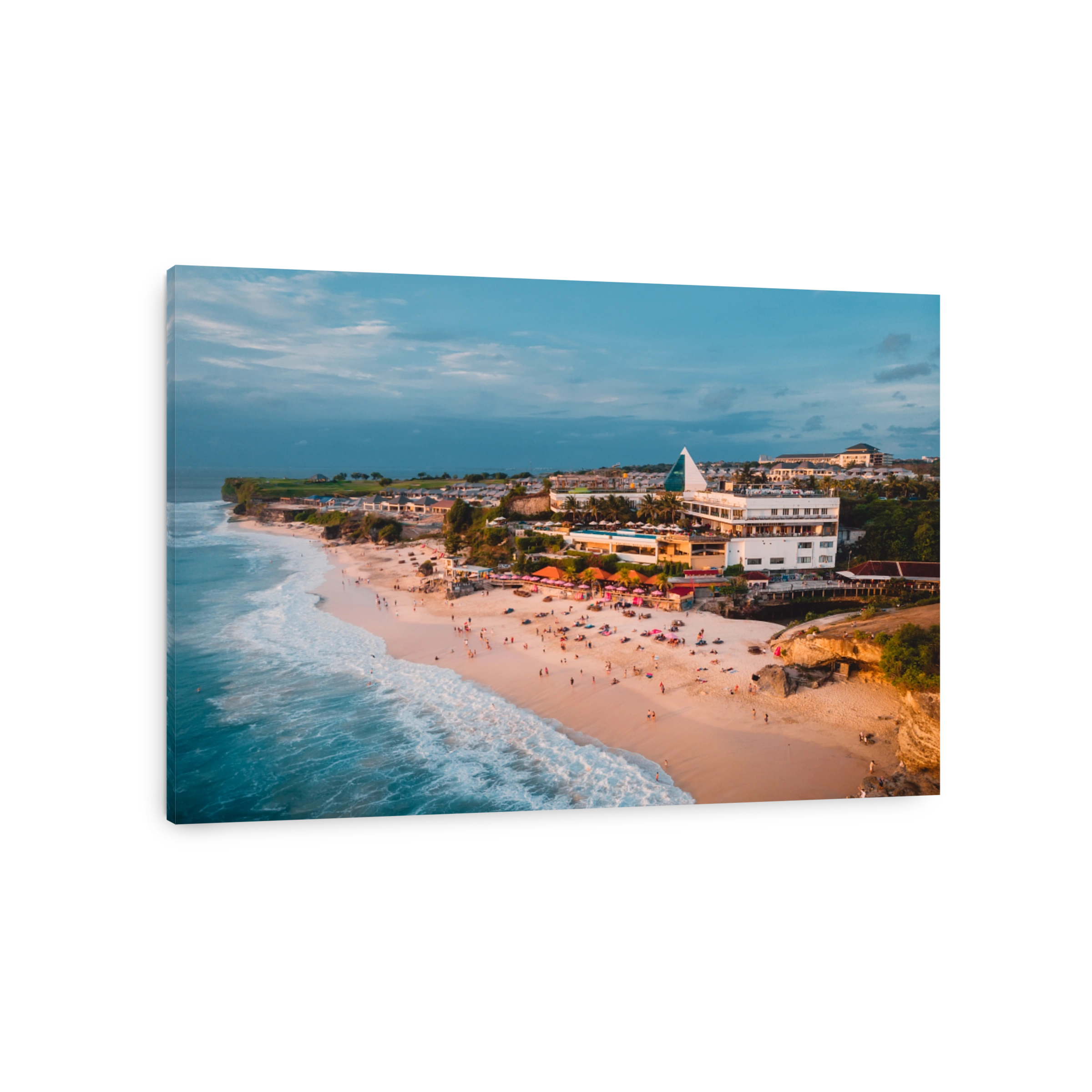 Tropical beach with turquoise ocean. Dreamland beach with sunset tones in Bali. Aerial view