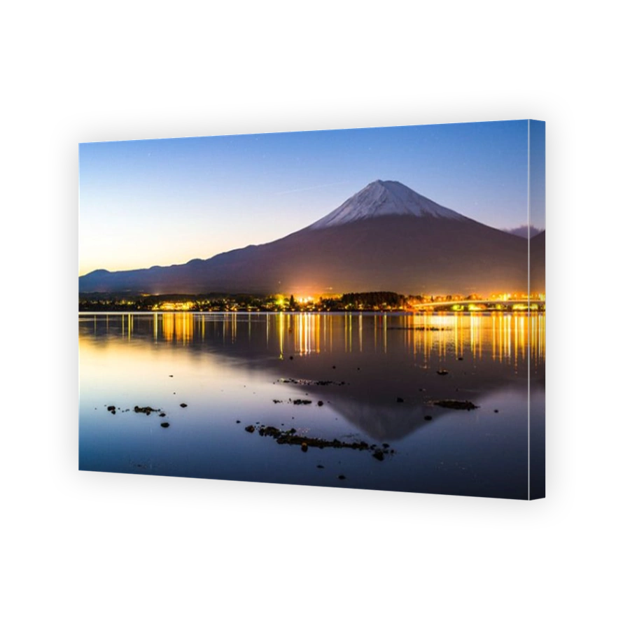 Mt. Fuji at dusk over Lake Kawaguchi in Japan.