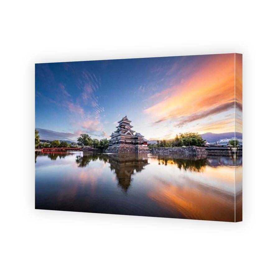 The historic Matsumoto Castle in Matsumoto, Japan at twilight.