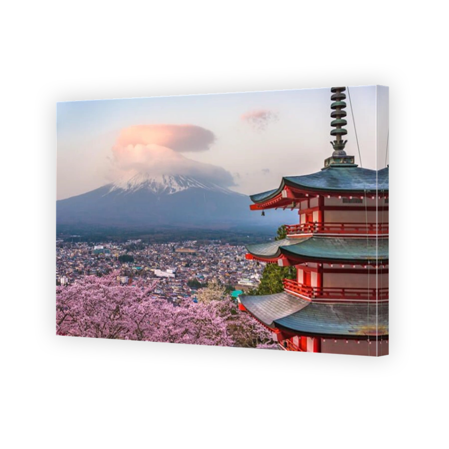 Fujiyoshida, Japan at Chureito Pagoda and Mt. Fuji in the spring with cherry blossoms.