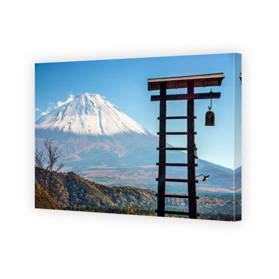 Fuji Mountain and an old village bell tower in Japan.