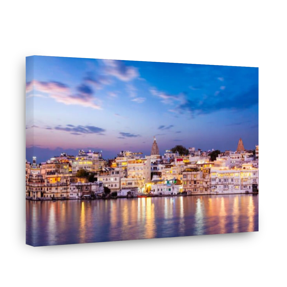 Evening view of  illuminated houses on lake Pichola in Udaipur