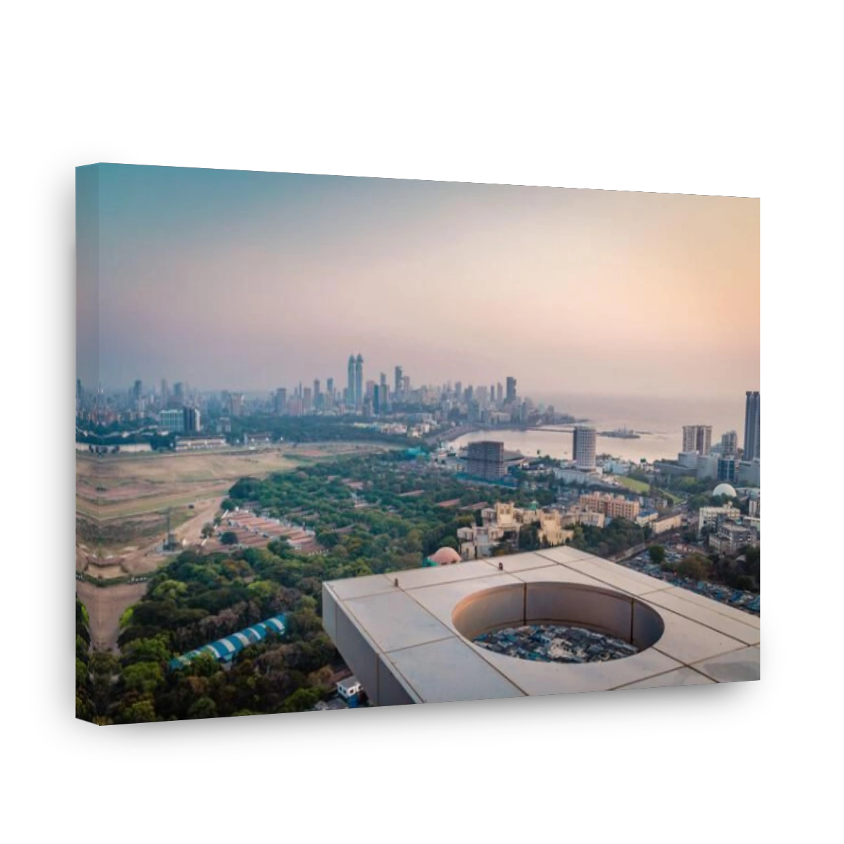 The Aerial view of the Mumbai city skyline at sunset with glowing light