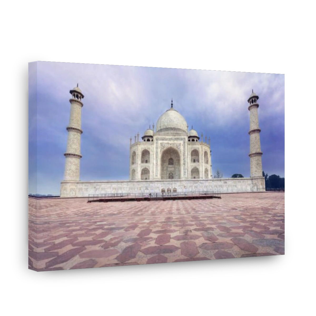 Taj Mahal tomb from white marble at blue dramatic sky in Agra, Uttar Pradesh, India