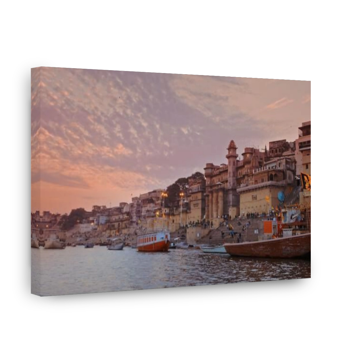 Varanasi, Uttar Pradesh, India. Cityscape Skyline In Evening Lights. Evening Pink Purple Sunset Sky, Dusk . Camera Moving Along Riverbank Embankment