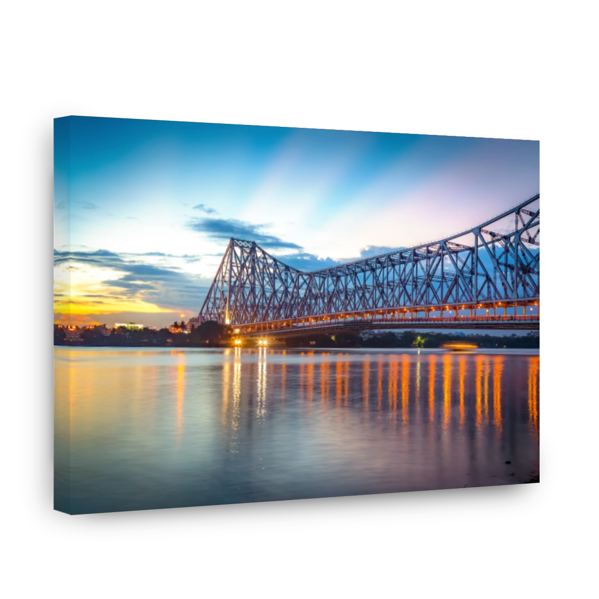 Howrah bridge on river Ganges at Kolkata at twilight with moody sky