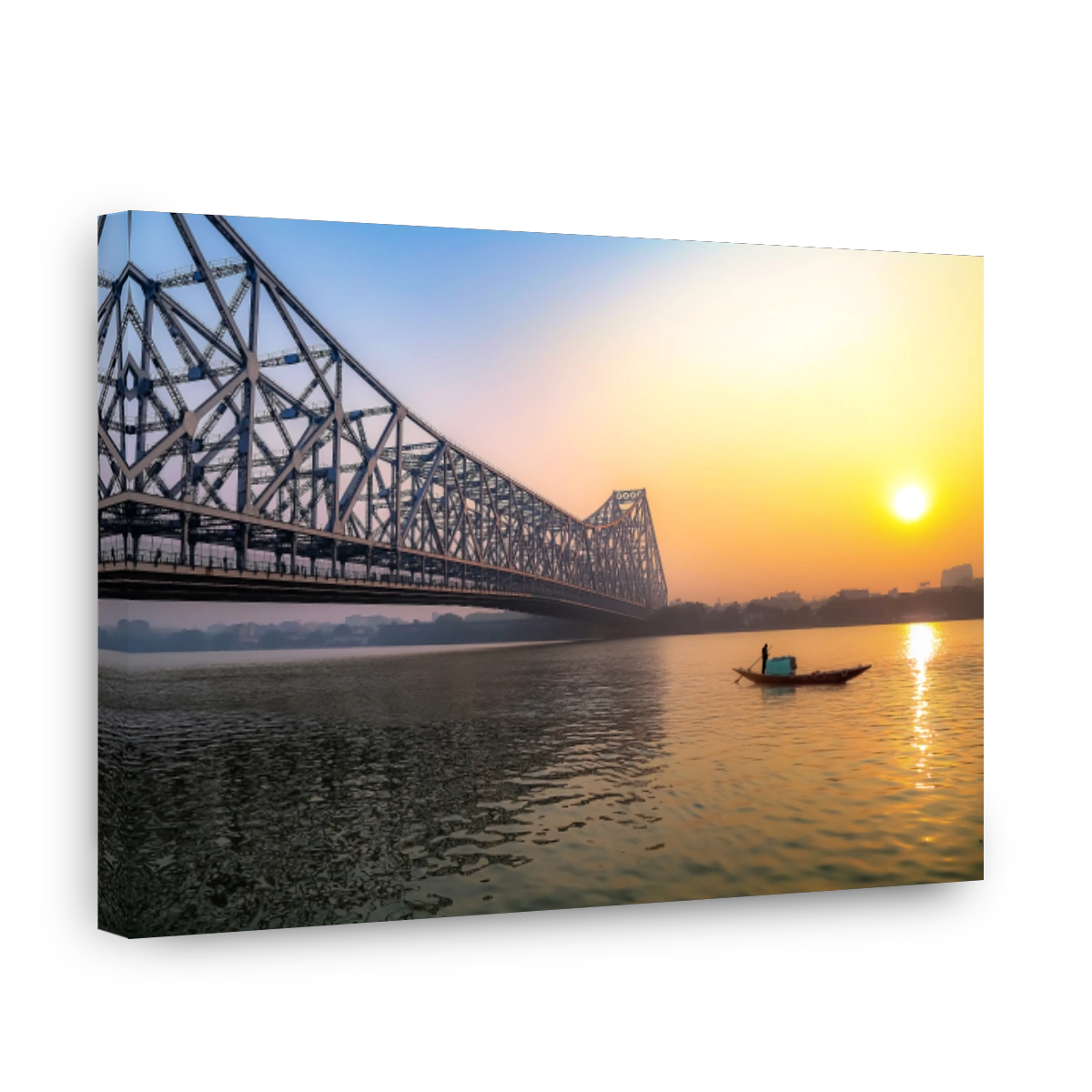 Historic Howrah bridge with boat on river Ganges at Kolkata, India