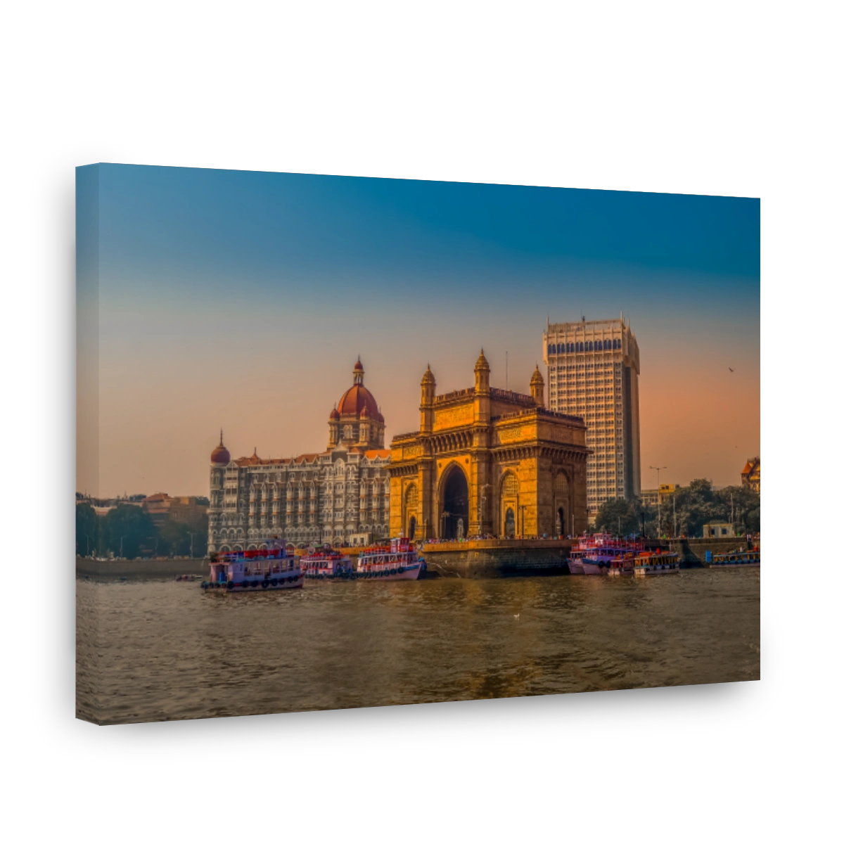 Beautiful Gateway of India near Taj Palace hotel on the Mumbai harbour with many jetties on Arabian sea