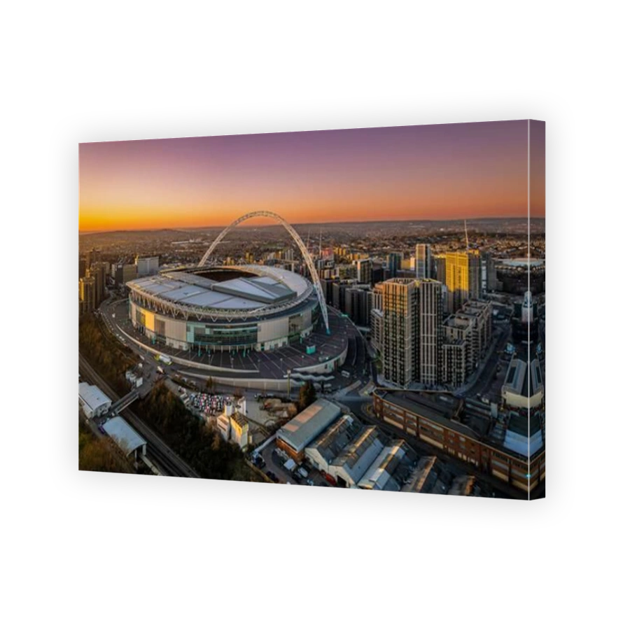Wembley Stadium with arch lit up in Red and White to support the England football team