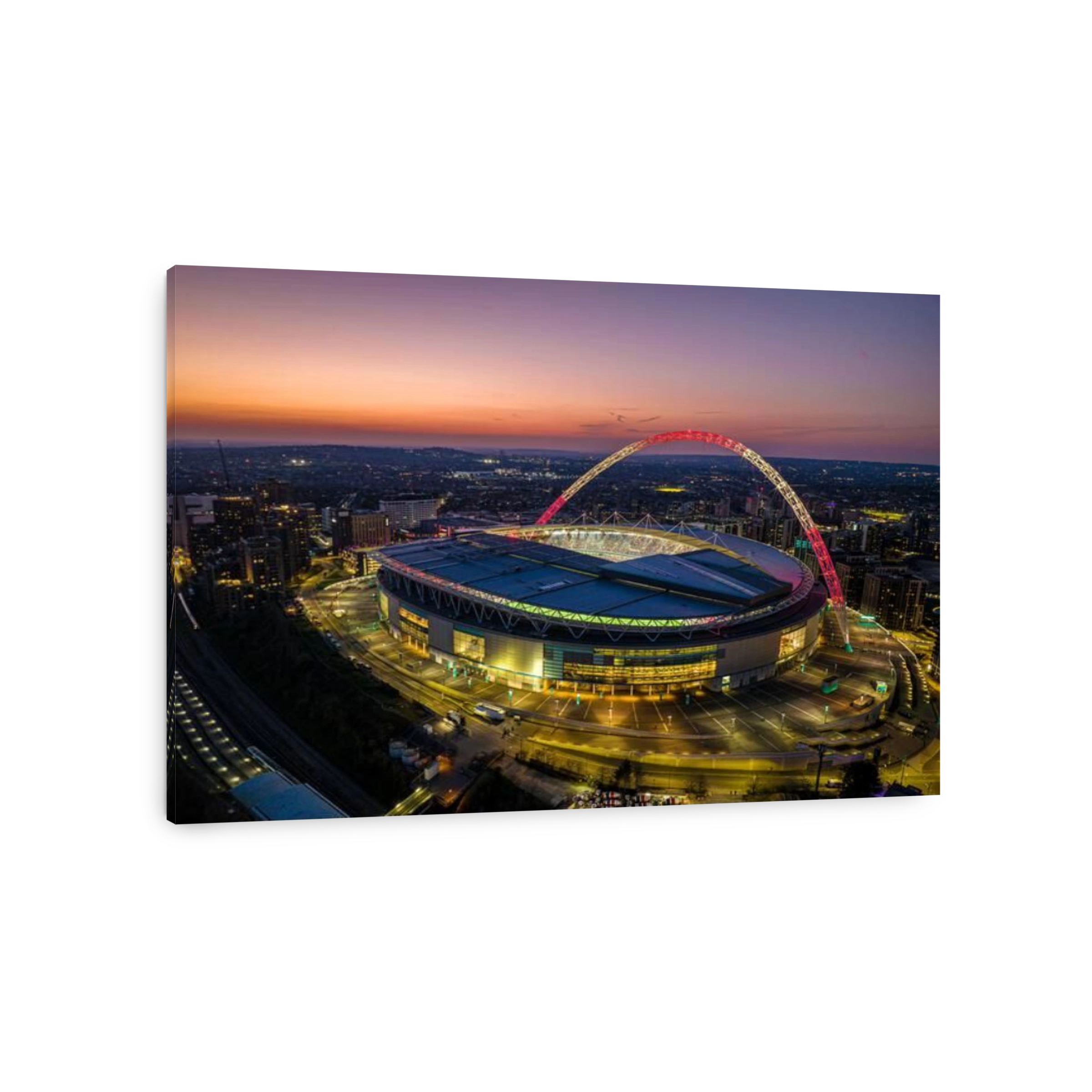 Wembley Stadium with arch lit up in Red and White to support the England football team