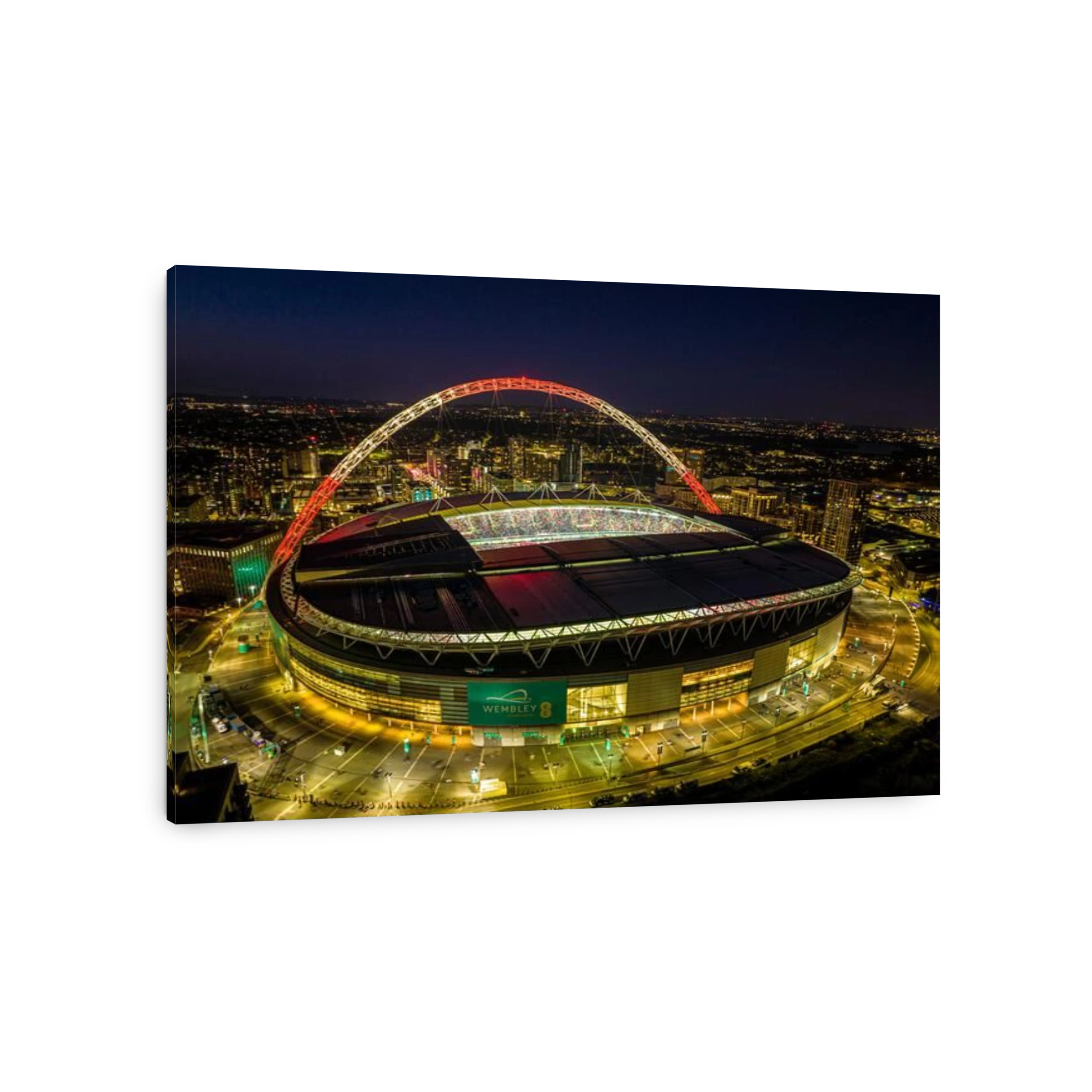 Wembley Stadium with arch lit up in Red and White to support the England football team
